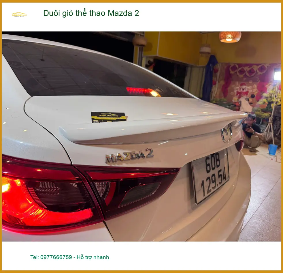 Chị Loan lắp đuôi gió thể thao Mazda 2 tại Quận 6 để tăng tính khí động học