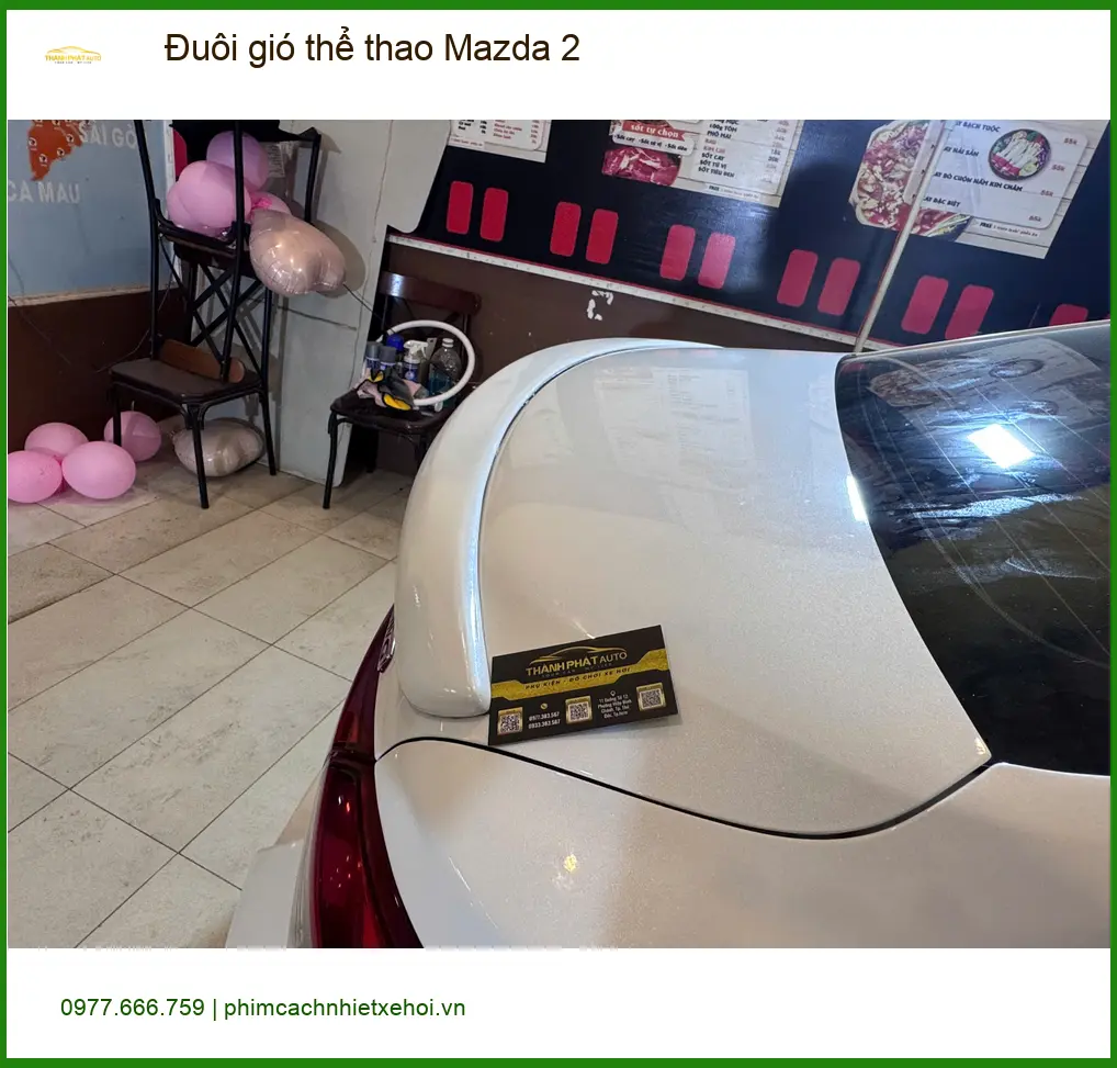 Chị Loan lắp đuôi gió thể thao Mazda 2 tại Quận 6 để tăng tính khí động học ảnh thực tế 2