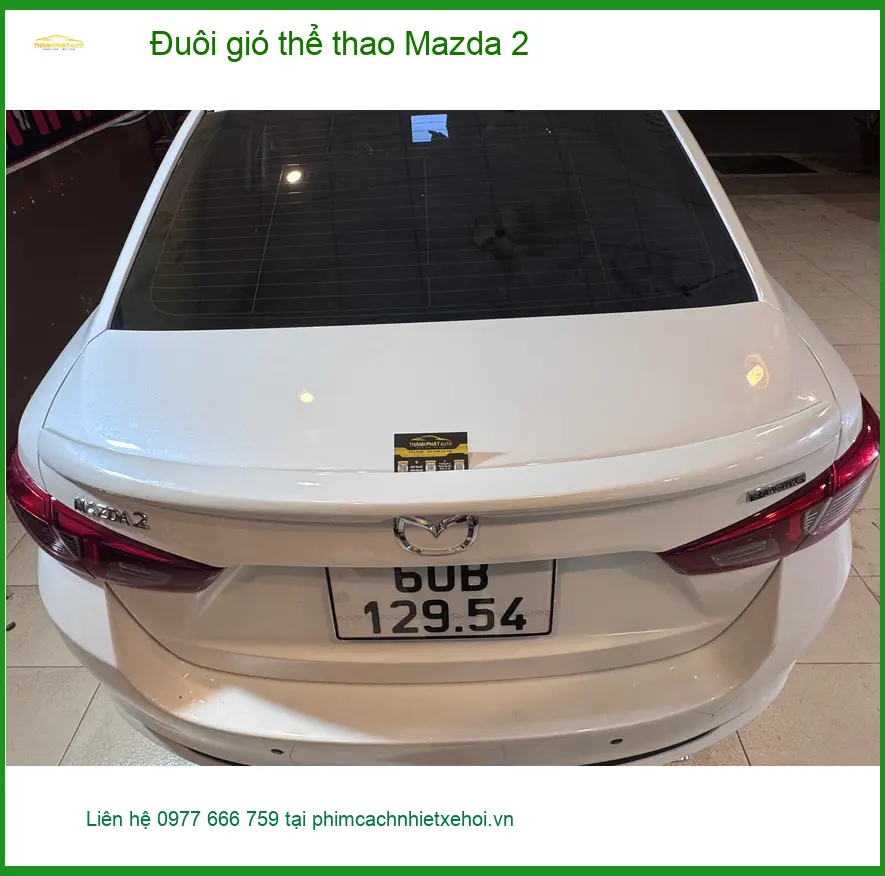 Anh Quốc Anh lắp đuôi gió thể thao Mazda 2 tại Quận 7 để xe trông cá tính hơn ảnh thực tế 2