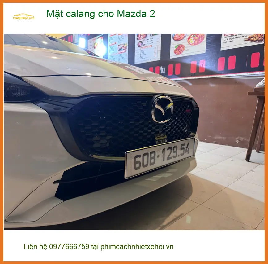 Chị Thanh lắp mặt calang cho Mazda 2 tại Quận 3 để thay mới diện mạo xe ảnh thực tế 4