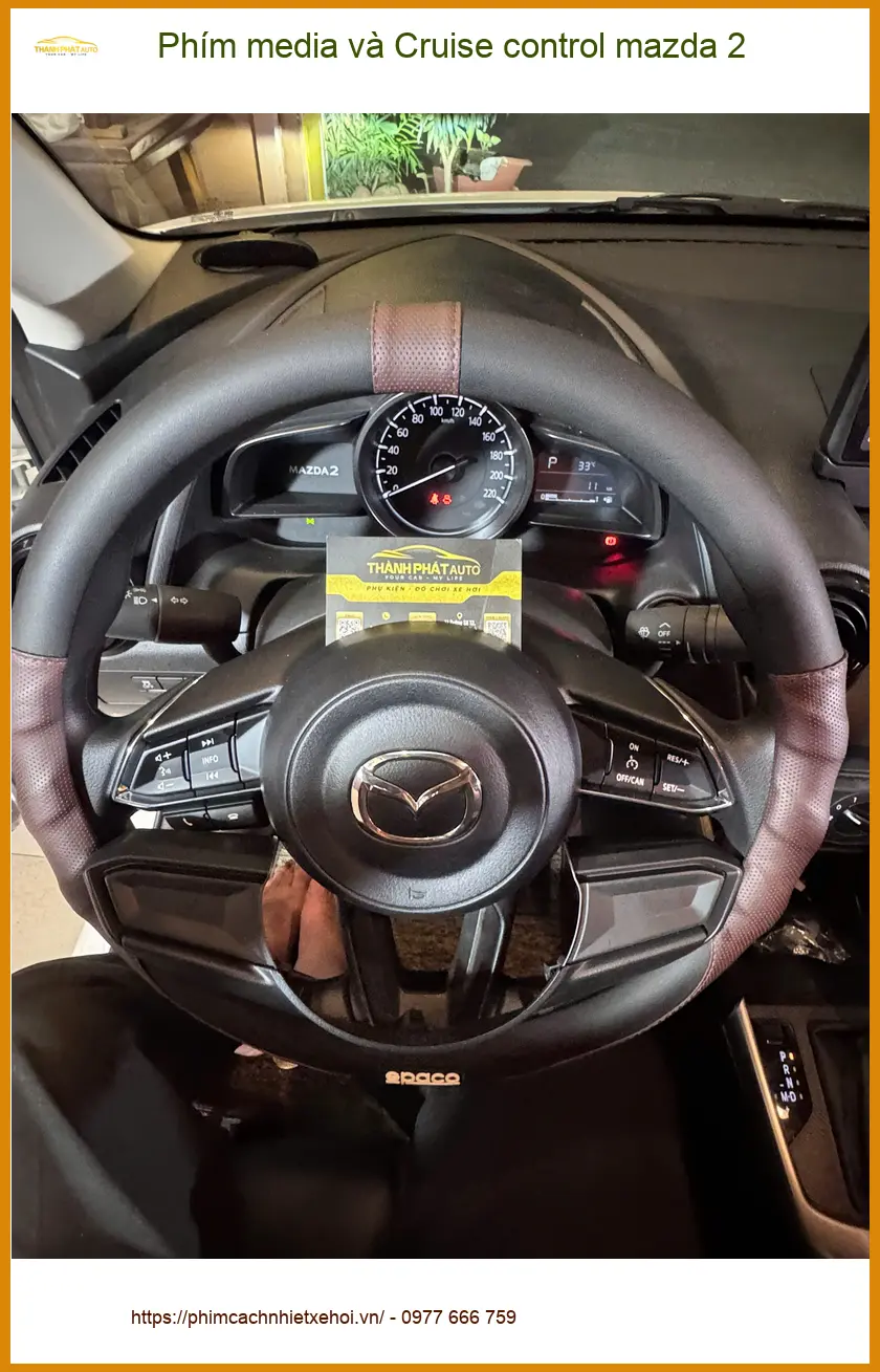 Anh Quốc lắp phím media và Cruise control Mazda 2 Quận 11 lái xe tiện nghi ảnh thực tế 2